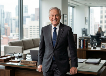 Picture of a confident business man in his office